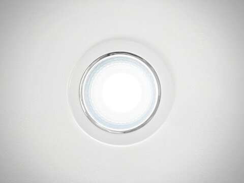 The ceiling downlight is on. There is light from the LED bulb