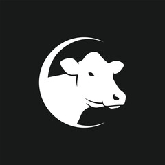 Minimalist white cow head silhouette inside a circular frame on a black background