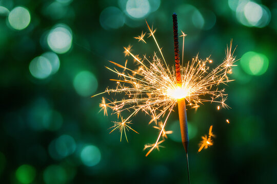 Sparkler on a green background