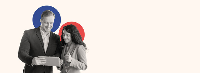 Two business professionals share an engaging moment while looking at a tablet. They are focused and smiling, creating a positive atmosphere of teamwork.