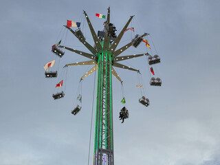 The illuminated panoramic swing ride in the photo is the Sky Tower, a 40-meter tall Christmas attraction installed in Cortona that offers a breathtaking view of the city
