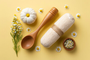 Relaxing spa essentials on pastel yellow background, herbal compress, wooden massage tool and chamomile flowers. Generative AI image