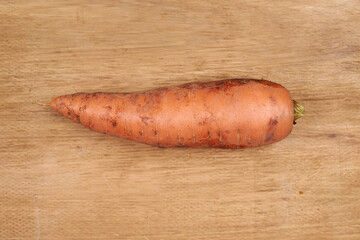 Autumn harvest, vegetables and fruits lie on a wooden table.