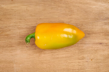 Autumn harvest, vegetables and fruits lie on a wooden table.