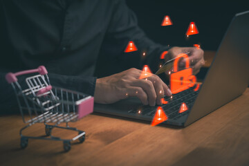 Cybersecurity risk in online shopping illustrated with warning icons and a digital lock as a person enters card details on a laptop, representing fraud alerts, payment security, and data protection.