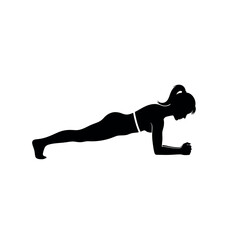 Silhouette of a woman performing a plank exercise.