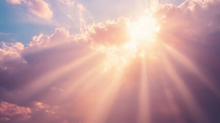 Sunlight illuminating the sky through white and gray clouds on a clear day