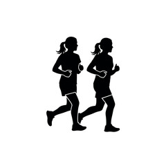 Obraz premium Two female runners jogging together in silhouette.