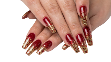 Elegant female hands showcasing long coffin nails with a luxurious red and gold glitter gradient manicure perfect for beauty and fashion concepts