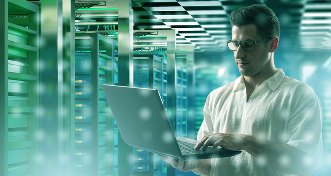 Data center technician monitors server performance with a laptop, ensuring stable network operations, system security, and efficient infrastructure management. - Powered by Adobe
