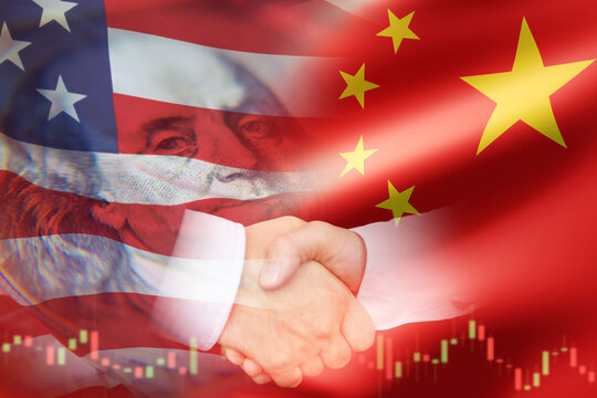 International trade negotiations symbolize cooperation as two partners shake hands against US–China flags, reflecting economic dialogue and cross-border business relations. - Powered by Adobe
