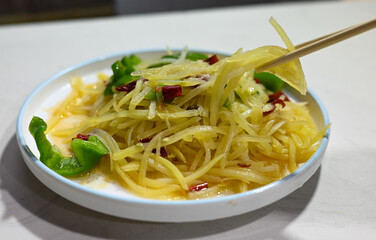 Stir-fried shredded potato with chilli - Chinese spicy food