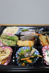 Assorted Japanese appetizers purchased at a supermarket in Tokyo, Japan