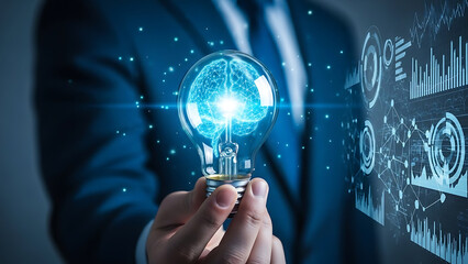 Businessman holding a glowing light bulb with a digital brain inside, symbolizing innovation, artificial intelligence, and cutting-edge technology amidst a futuristic data interface.