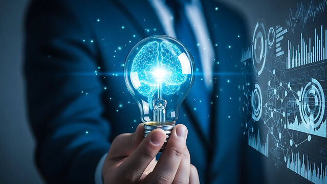 Businessman holding a glowing light bulb with a digital brain inside, symbolizing innovation, artificial intelligence, and cutting-edge technology amidst a futuristic data interface. - Powered by Adobe