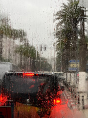 car window in the rainy city
