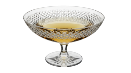 Isolated crystal stemmed bowl with golden liquid, cut glass dessert dish for celebration
