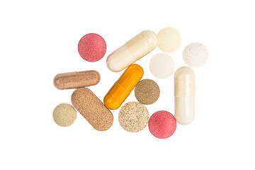Various pills on white background