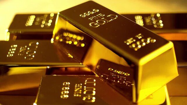 Shiny gold ingots stacked on a warm, reflective surface; gleaming, textured, opulent, radiant stack