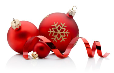 Three red Christmas decoration baubles and curling paper ribbon