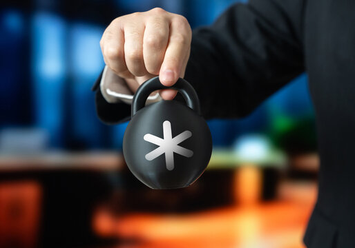 A businessman holds a weight with a star on it. Hidden appendices and clarifications in the contract. Fine print clauses create unexpected obligations. Legal traps and unfair conditions.