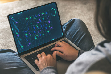 Remote Worker Managing a Complex Workflow or Project Schedule on a Laptop, Utilizing a Digital Gantt Chart or Flow Diagram