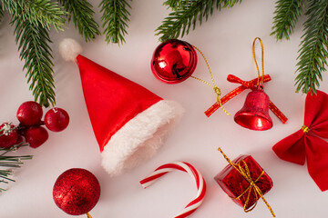 Red Christmas decoration on white background, holiday idea, Christmas flatlay concept.