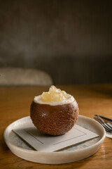 Chocolate dessert served on ceramic plate with creative presentation