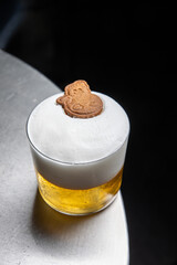 A delicious alcoholic cocktail at the bar. The bartender prepares cocktails