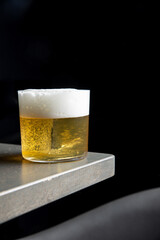 A delicious alcoholic cocktail at the bar. The bartender prepares cocktails