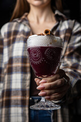 A delicious alcoholic cocktail at the bar. The bartender prepares cocktails