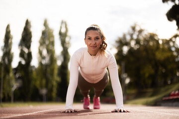 Fototapeta premium Woman Doing Push Up