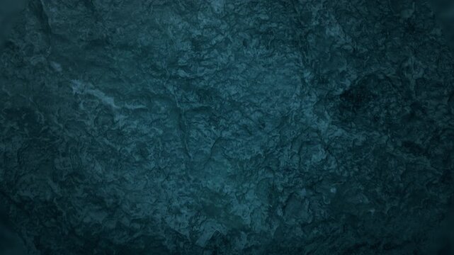 wet mineral surfaces on teal rocks creating submerged cavern atmosphere