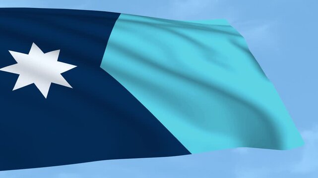 Minnesota flag is waving against a clear blue sky.