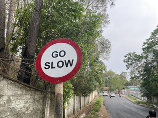 a beautiful slow speed sign board photo click by still