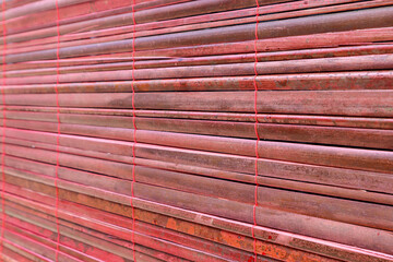 Asian style bamboo curtain texture. Bamboo wood curtain or blind for window seamless background and texture. 