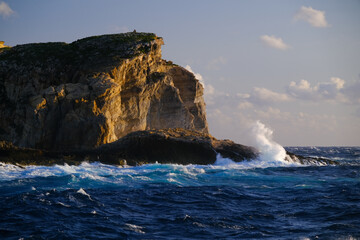 waves crashing on rocks