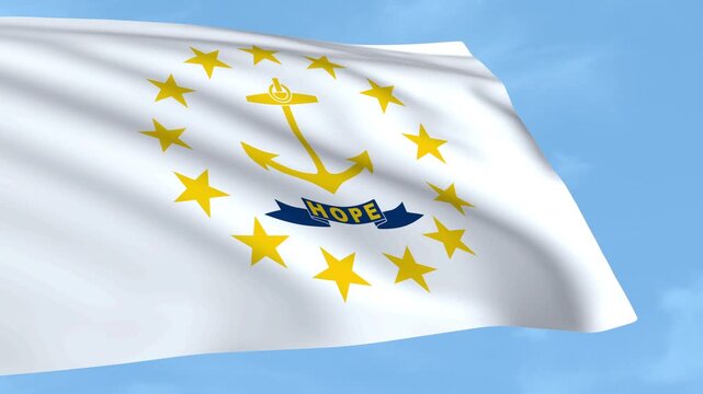 Rhode Island flag is waving against a clear blue sky.