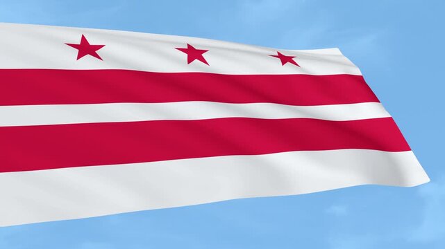 Washington DC flag is waving against a clear blue sky.