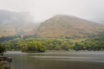 Inchlonaig Island in Loch Lomond on a misty day, Loch Lomond is a freshwater Loch considered the start of the Highlands and is part of The Loch Lomond and The Trossachs National Park