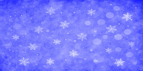 Blue Christmas abstract background pattern with decorative snowflakes, light, and stars
