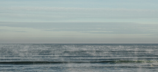 Global warming or warm ocean creating haze.