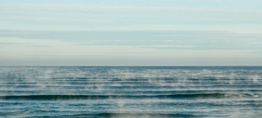 Global warming or warm ocean creating haze.