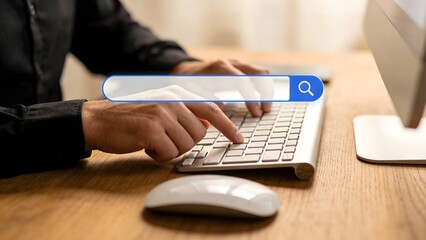 Person typing on keyboard with search bar overlay