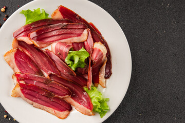 Duck breast slice magret smoked meat poultry meat food tasty snack fresh delicious gourmet food background on the table rustic food top view copy space