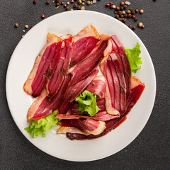 Duck breast slice magret smoked meat poultry meat food tasty snack fresh delicious gourmet food background on the table rustic food top view copy space