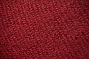 Fototapeta premium Closeup of Red Knitted Fabric Texture with Soft Woolen Surface