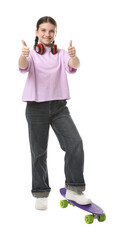 Cute girl with headphones and penny board showing thumbs up on white background