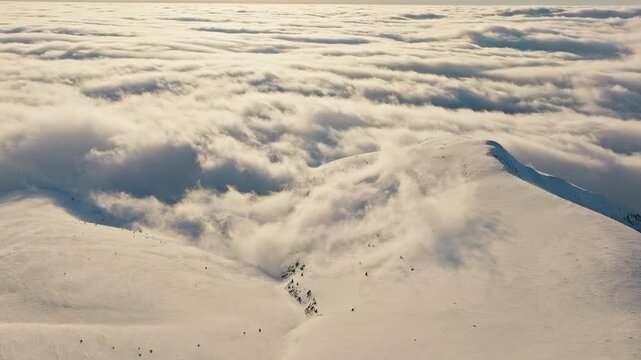Footsteps fade away, Mist shrouds fading footprints, Footprints disappear into drifting fog and snow, Scattered footprints dissolve into wispy clouds over icy terrain