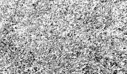 Macro halftone grain resembling cloudy sky, with dense diagonal speckles in black on a transparent background, creating rough abstract noise.